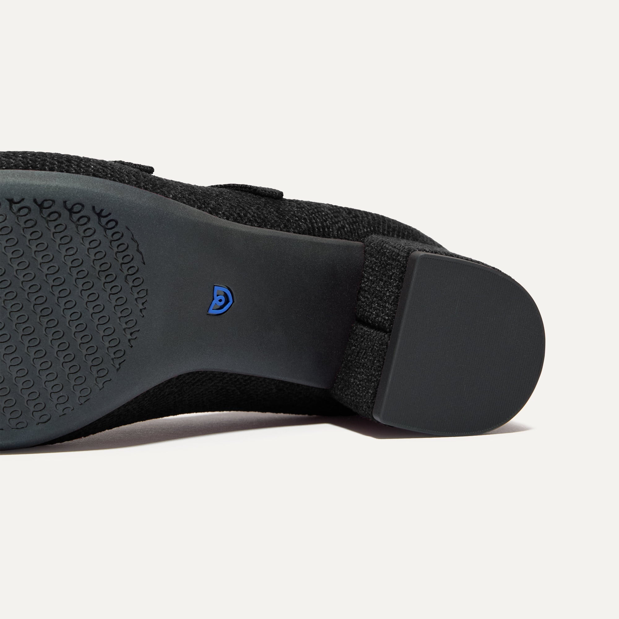 Outsole of The Double Buckle Mary Jane Heel in ReVelvet™ Black.