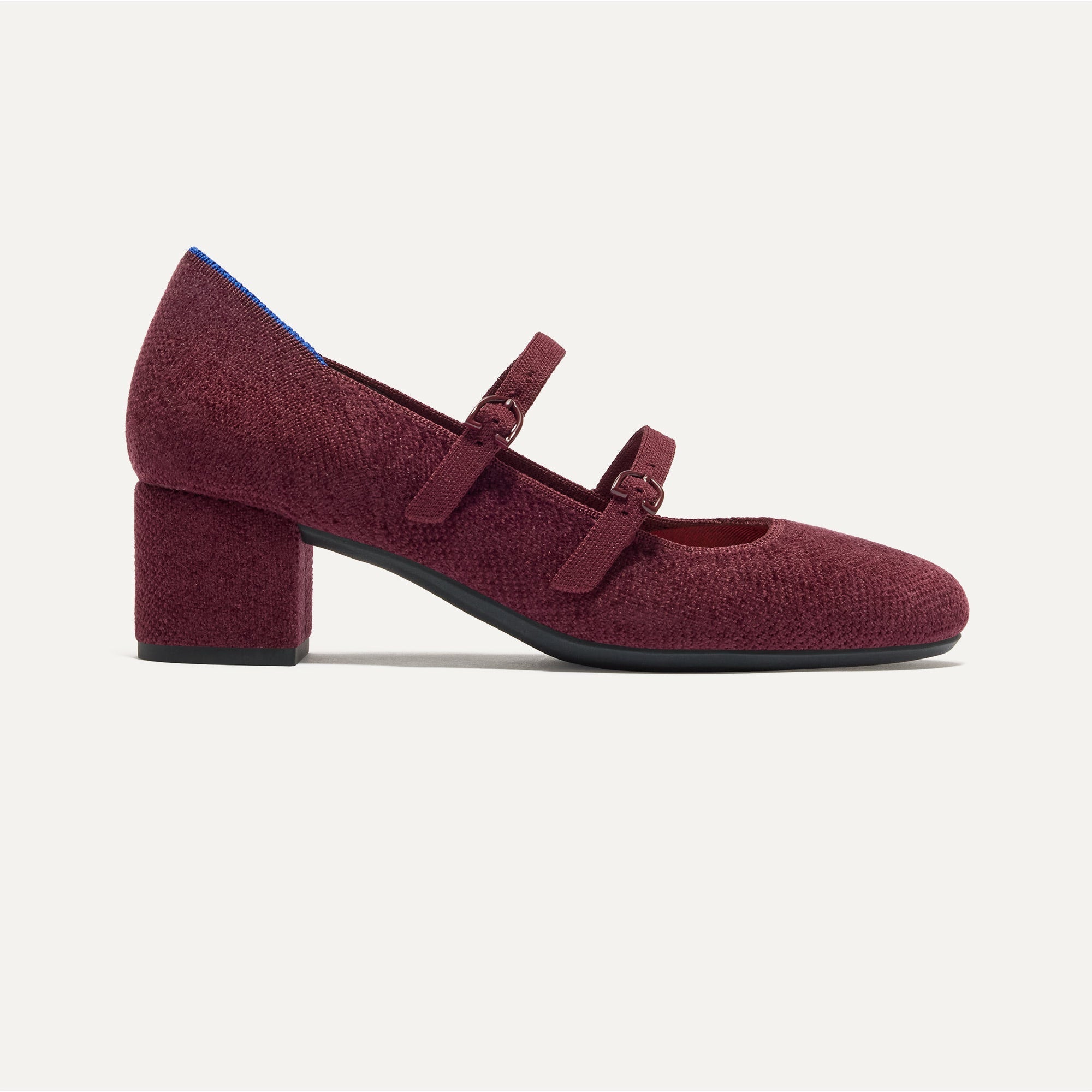 The Double Buckle Mary Jane Heel in ReVelvet™ Syrah shown from the side.