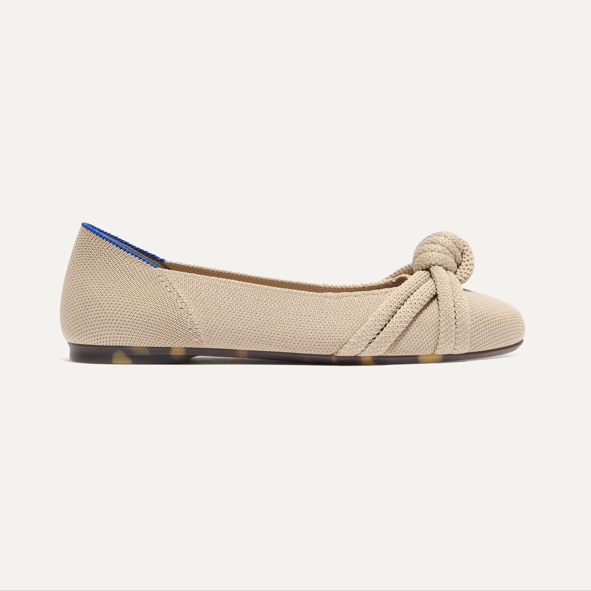 The Knot Ballet Flat in Ecru shown from the side.