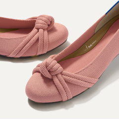 Close up of the rounded toe and knotted detail of The Knot Ballet Flat in Peony.