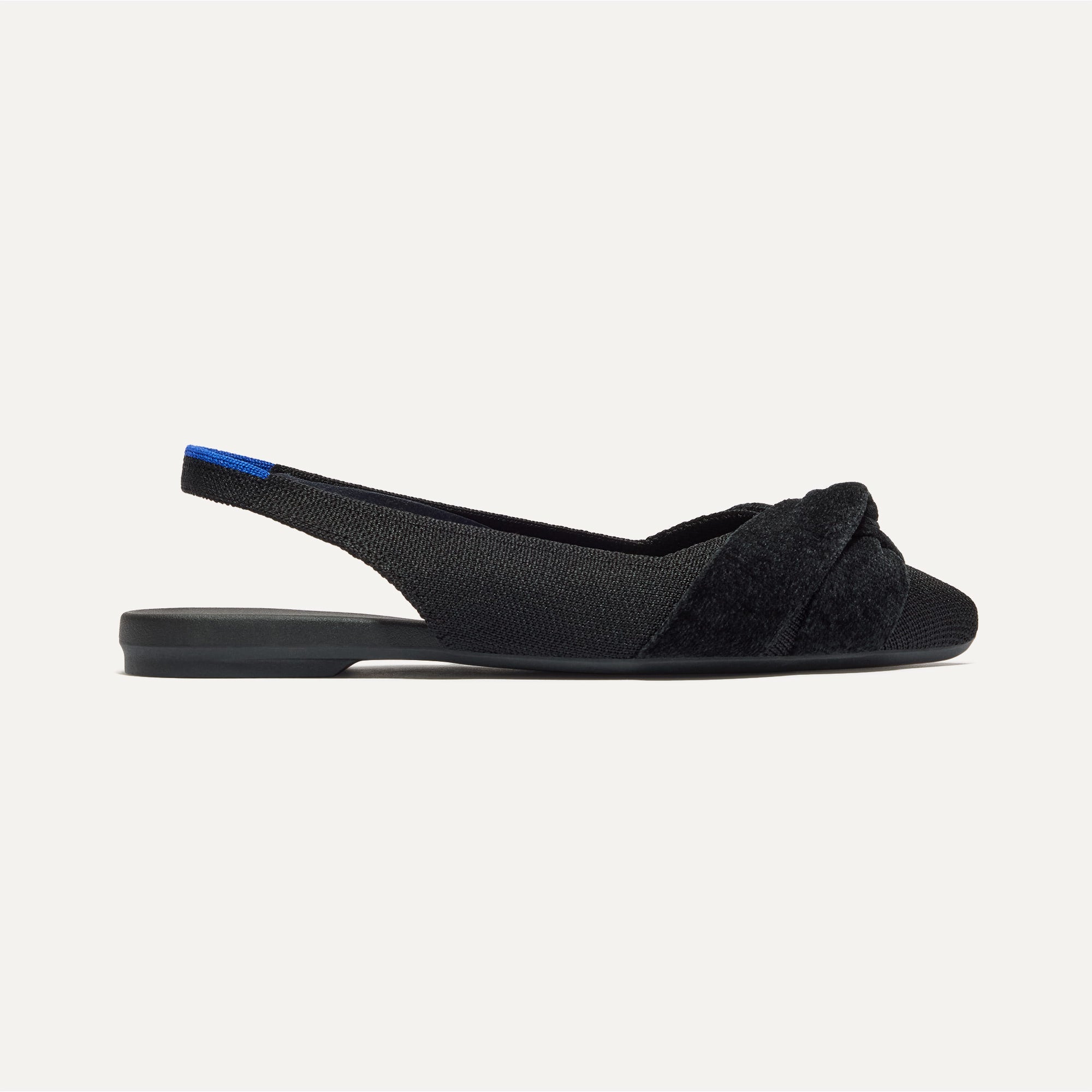 The Twist Point Slingback in Black shown from the side.