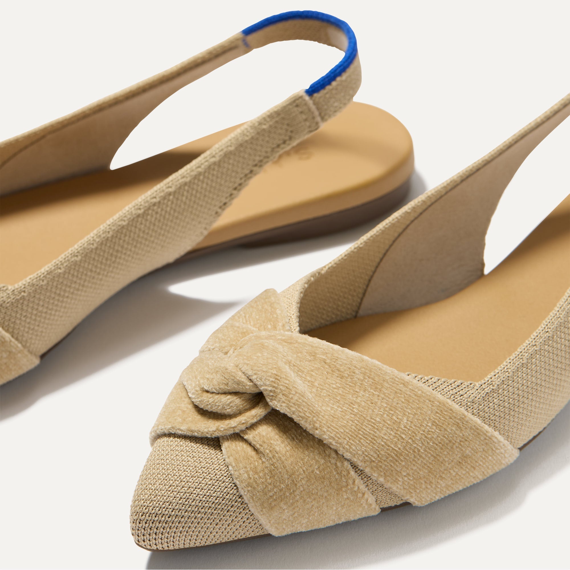Close up of the toe and twist detail on The Twist Point Slingback in Brioche.