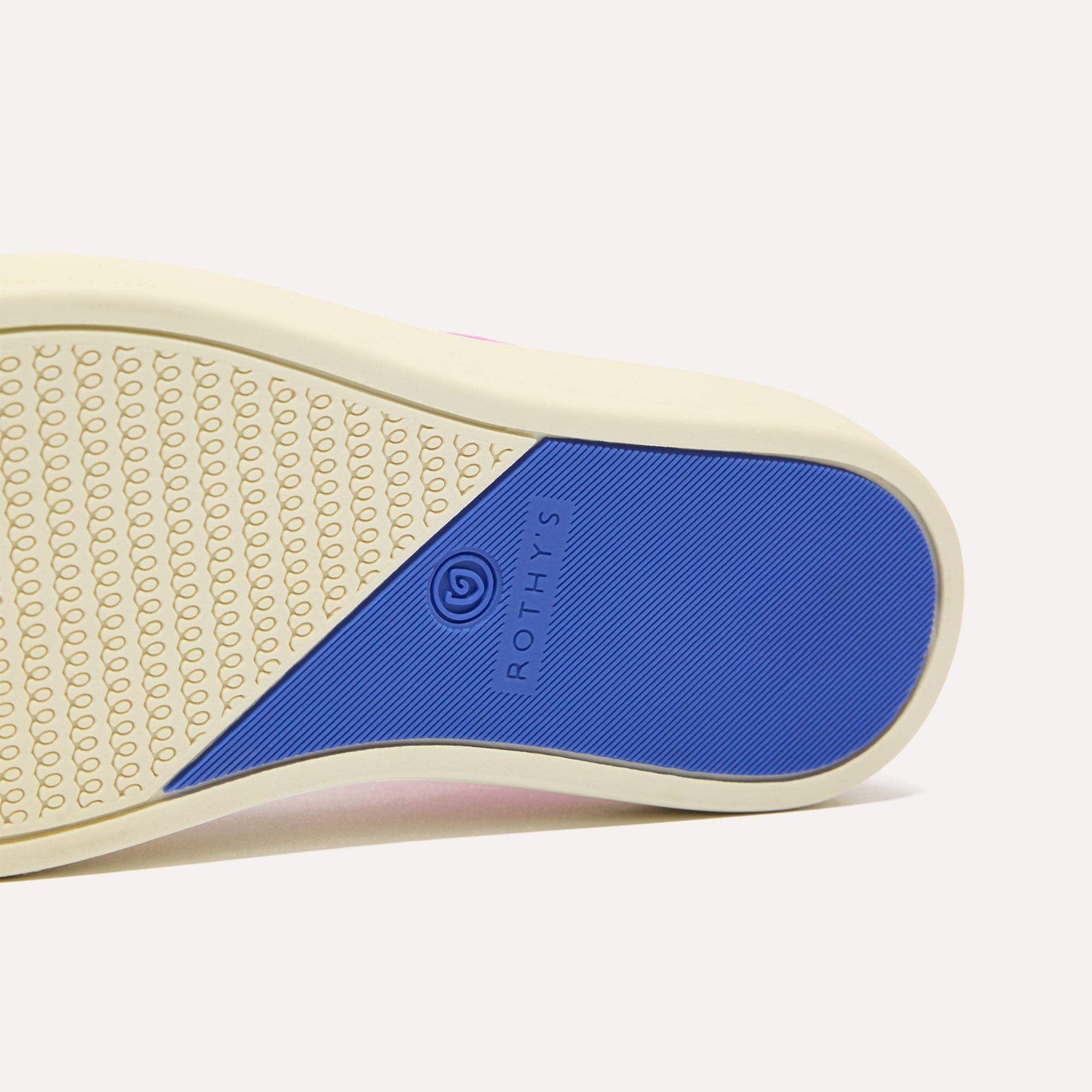 The sole of The Kids Strap Sneaker in Pink Taffy.