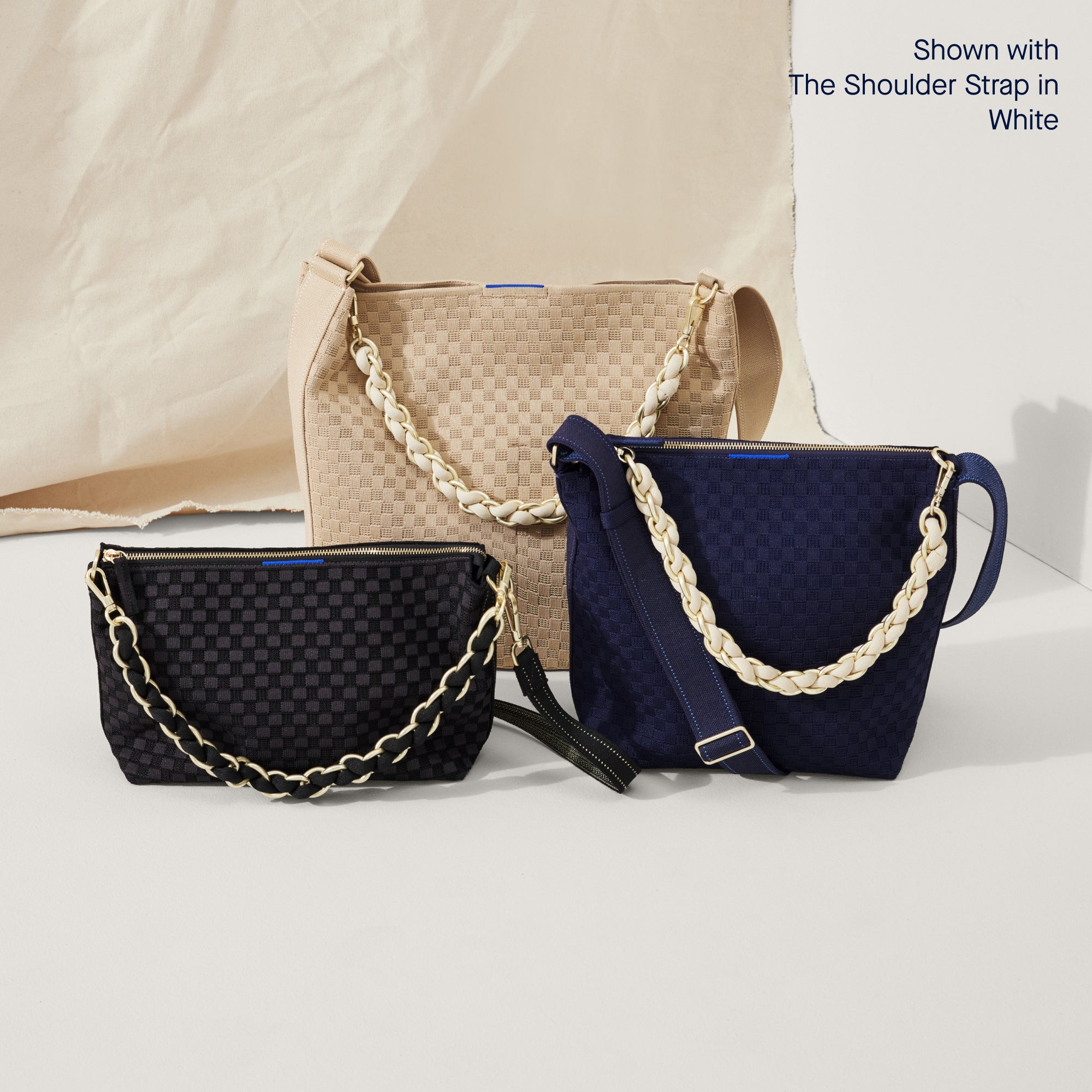 The Shoulder Strap shown paired with The Bucket Bag, The Daily Crossbody and The Mini Zip Bucket.