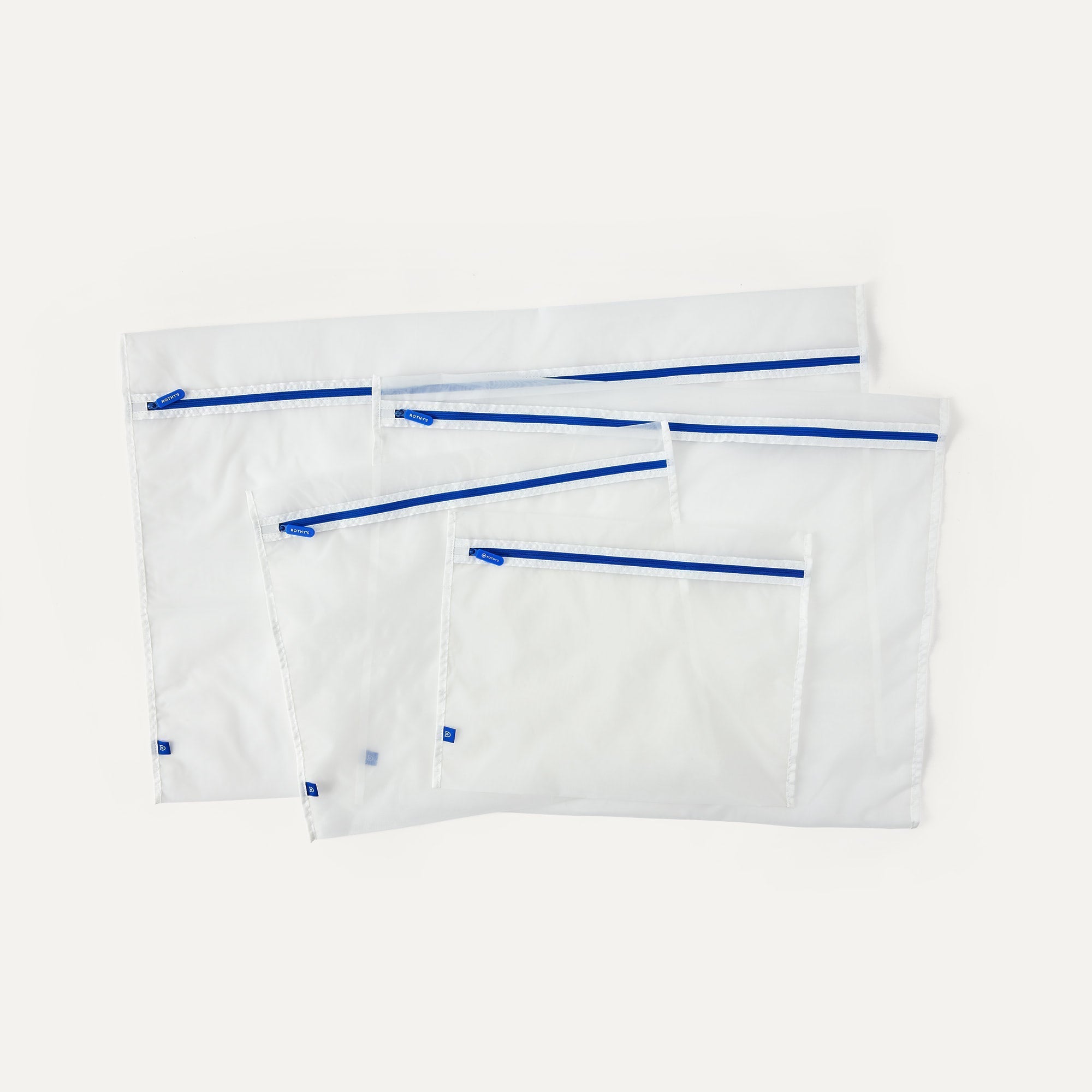 Laydown of The Easy Wash Bag in four different sizes.